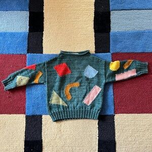 Misha & Puff green wool shapes roll neck sweater, size 4-5 yrs.